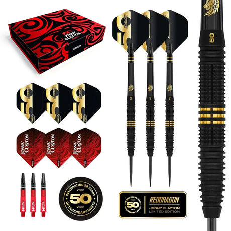Anniversary limited edition tungsten darts set with gold ringed barrels, close-up grip texture, accessories, flights, and collector’s box.