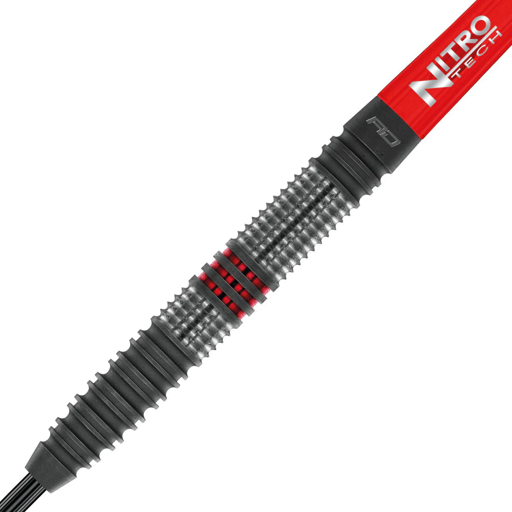 Close-up of 90% tungsten dart barrel with deep grip texture and red rings, showing detailed machined knurling and shaft connection.