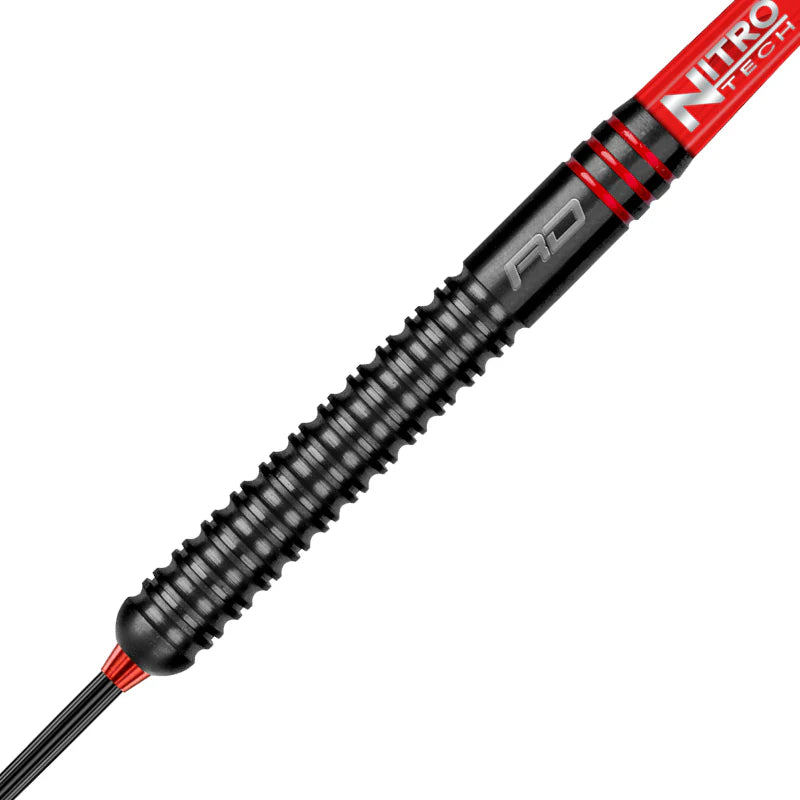 Close-up of Milano RS 0.2 tungsten dart barrel with black grooved grip, red accents, and detailed shaft for enhanced dart control