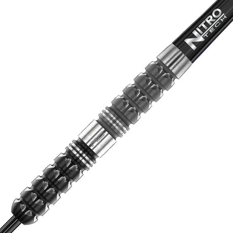 Macro close-up of 90% tungsten dart barrel with aggressive textured grip, precision grooves, and silver finish for dart players