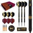 Limited edition 90% tungsten darts set with three darts, extra flights, accessories, close-up grip, and anniversary box on white background