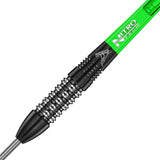 Close-up of black tungsten dart barrel with precision grip and engraved logo, green Nitro Tech shaft, isolated on white background