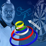 Stacked colored darts practice rings in progression with dartboard and player background for darts training accuracy