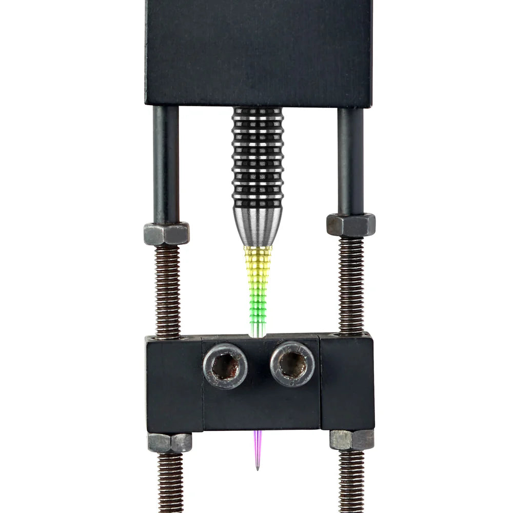 Close-up of raptor gripped rainbow effect dart point in clamp, showing spearhead profile and ergonomic grip texture