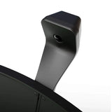 Close-up angled view of dartboard automatic scoring system camera mounted above board, showing installation and sensor design