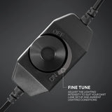 Close-up of dartboard light dimmer switch with fine-tune control knob and cable, showing lighting intensity adjustment feature for darts setup