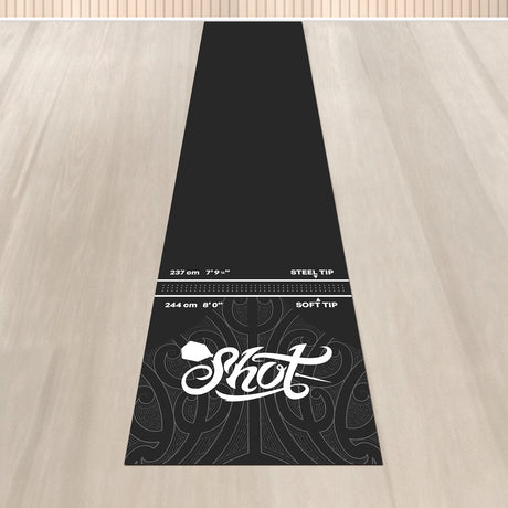 Full view of T shaped dart mat on wooden floor with throw line markings for steel tip and soft tip darts, textured surface design visible