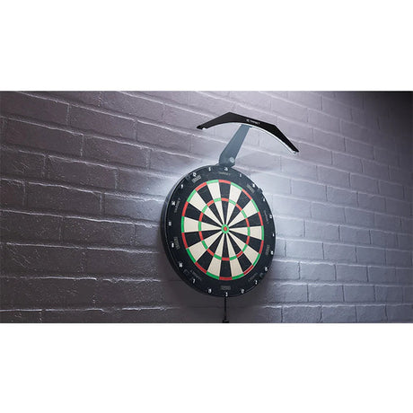 Dartboard mounted on wall with arc-shaped dartboard light installed overhead, showing bright even illumination for darts setup