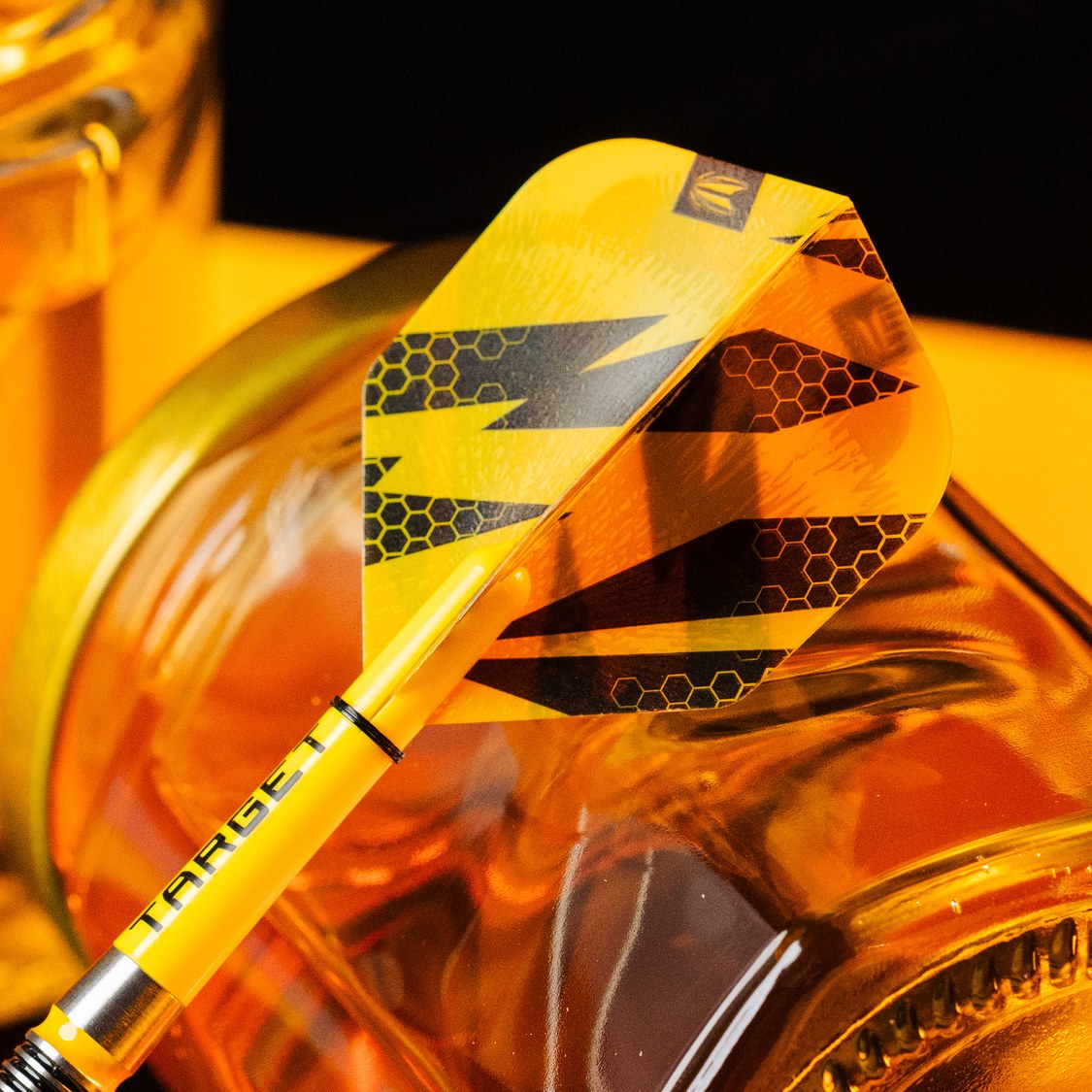 Target BUZZ Pro Ultra No.6 flights fitted to darts – lifestyle shot