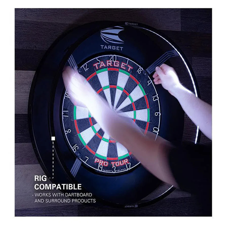 Top-down view of dartboard ring light being installed, hands attaching LED lighting for shadow-free darts play, rig compatibility shown