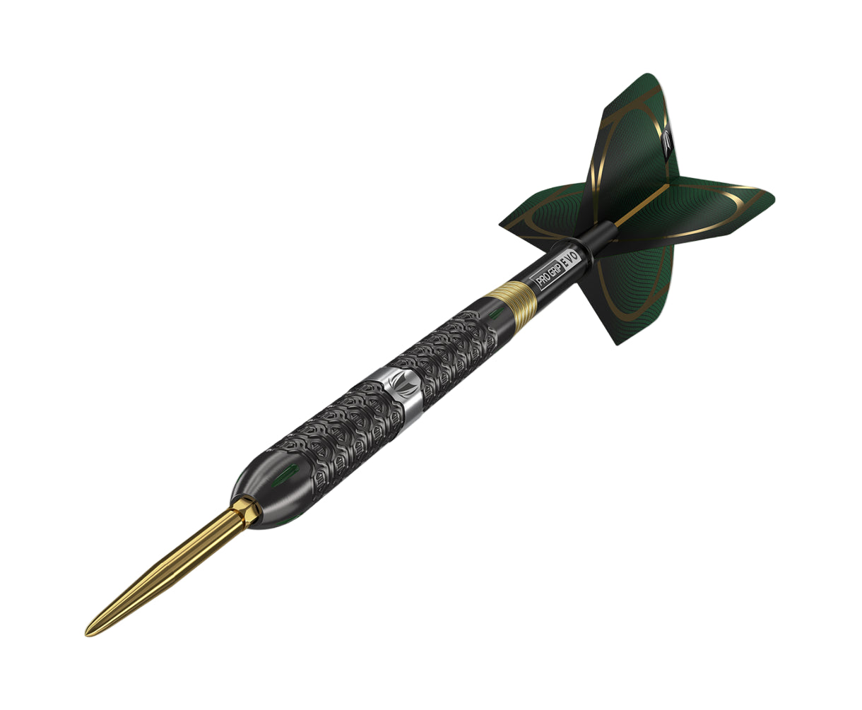 Angled dart view with precision milled grip, gold steel tip, green flight, and detailed barrel texture on white background
