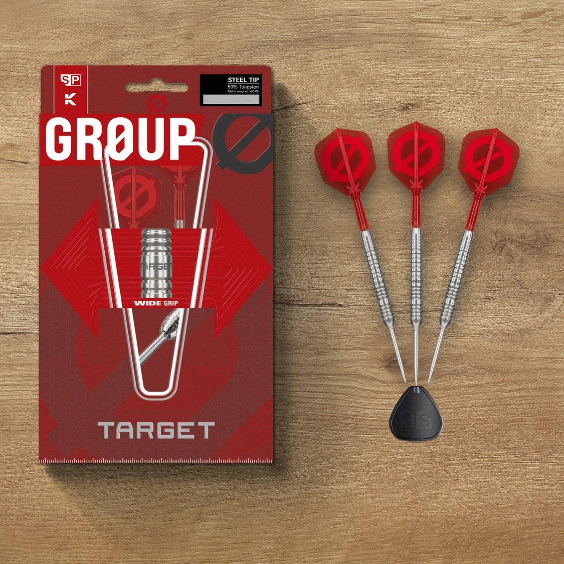 Target Group O 03 darts and packaging on a wooden table