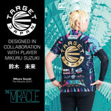 Lifestyle shot of dart player in custom jersey with bold graphics and Target Japan logo, showcasing collaboration for Mikuru Suzuki Gen 7 darts