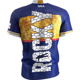 Back view of Josh Rock darts shirt with bold cracked stone design, gold accent, and detailed event graphics, isolated for darts apparel shoppers