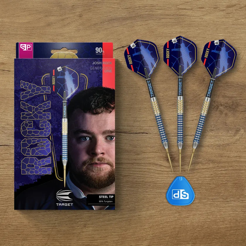Top-down view of Josh Rock G1 90% tungsten steel tip darts with packaging, three darts arranged side by side, and included flight on wood background