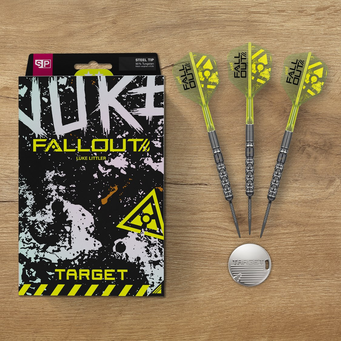 Target Luke Littler Fallout darts, Nuke packaging and Premium Swiss Key on a wooden table