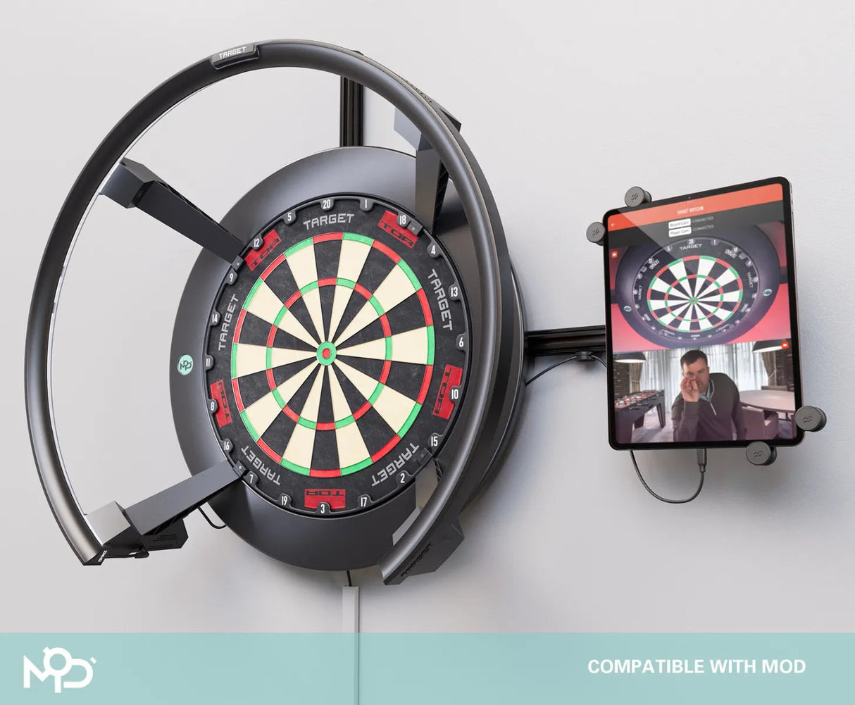 Angled view of auto scoring dartboard with LED light ring and wall-mounted screen for live scoring, ideal for darts setups