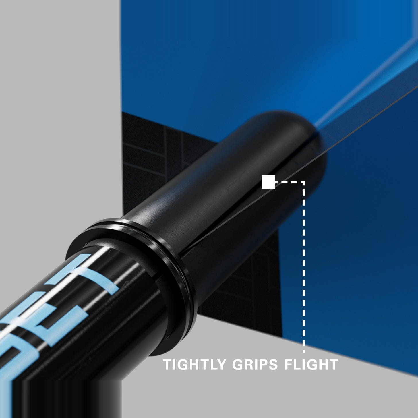 Close-up of a blue Pro Grip Tag shaft gripping a dart flight to prevent fallouts