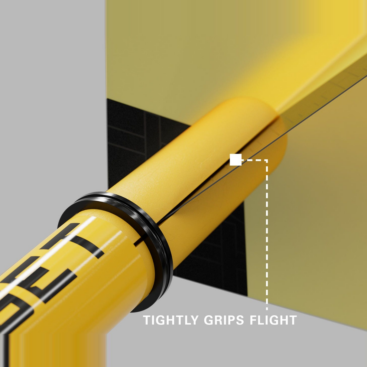 Close-up of a yellow Pro Grip Tag shaft gripping a dart flight to prevent fallouts