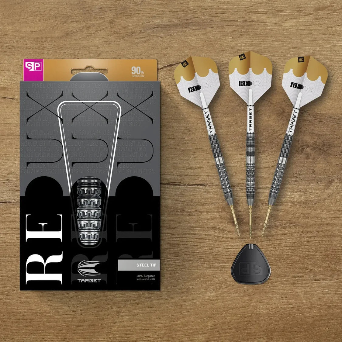 Top-down view of 90% tungsten steel tip darts set with three darts, flight protector, and retail packaging on wood background