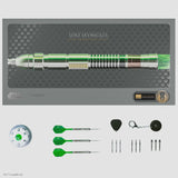 Top-down view of Luke Skywalker limited edition tungsten darts gift set with three green darts, spare tips, flights, accessories, and display packaging.