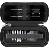 Top-down view of open darts case displaying three assembled darts and multiple dart shafts, tips, and accessories organized in compartments