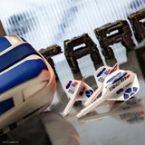 Angled view of three R2-D2 design darts with matching case, highlighting themed flights and shafts for Star Wars dart enthusiasts