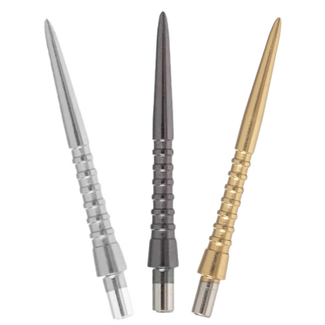 Three grooved dart points in silver, black, and gold finishes displayed side by side on white background, highlighting precision grip grooves