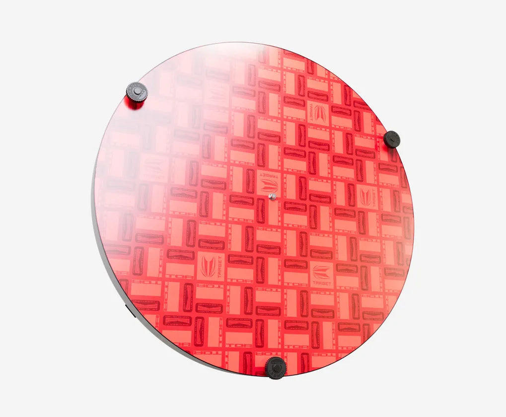 Top-down shot of dartboard back with red patterned surface and three mounting suction cups, ideal for secure dart setup