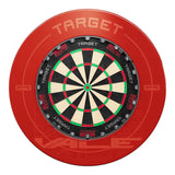 Red dartboard surround ring with printed design shown top-down around a standard bristle dartboard, isolated on white background