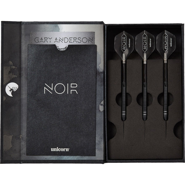 Top-down view of Gary Anderson Noir Phase 6 tungsten darts set, three darts securely arranged in foam display box, highlighting black flights and grip.