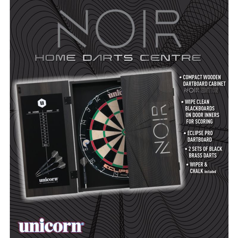 Angled view of home darts centre with wooden cabinet, open door showing dartboard, wipe-clean scoreboard and black darts inside.