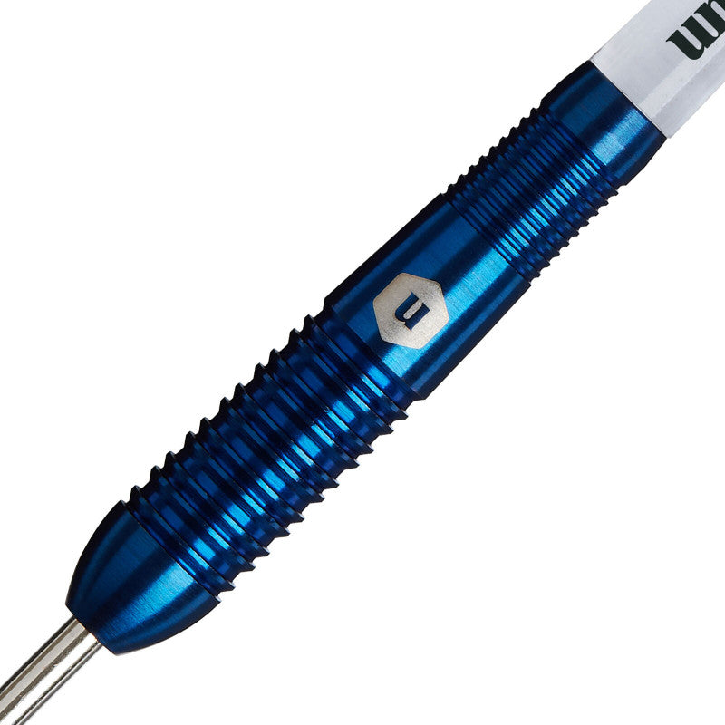 Close-up of blue 95% tungsten dart barrel with deep grip rings and engraved emblem, highlighting grip texture for precision throwing
