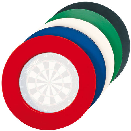 Stacked angled view of colorful professional dartboard surrounds for dartboard protection, includes red, blue, white, green, black rings