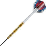 Angled full view of Daryl Gurney tungsten dart with gold grip barrel, engraved details, red-blue flight, isolated on white background