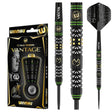 Steel tip tungsten darts set in retail packaging with close-ups of black grip barrels, green rings, and textured flights