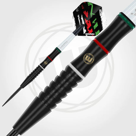 Angled close-up of black 90% tungsten dart barrel with ringed grip, red and green accents, and urban style dart flight on white background