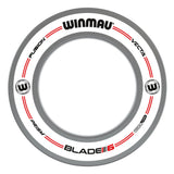 Top-down view of dartboard surround ring with white and grey design, product branding, and red accents, isolated on white background