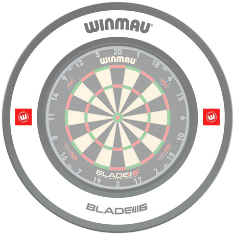 Top-down view of white dartboard surround mounted on dartboard, showing full circular coverage and protective design for darts setup