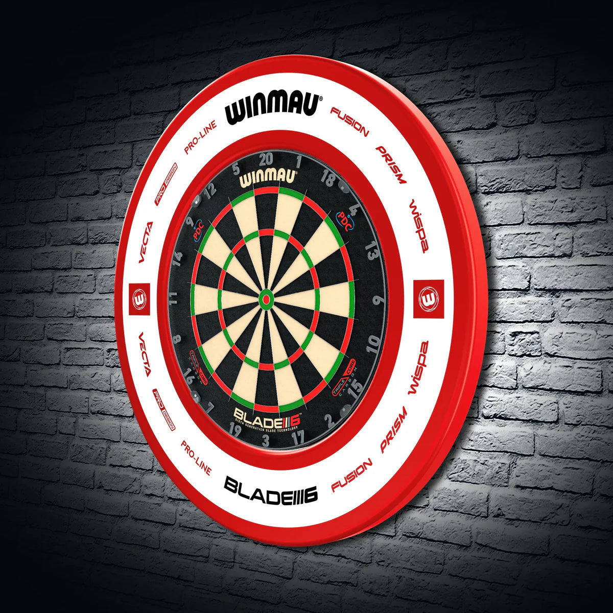 Red dartboard surround fitted around dartboard on brick wall, full view highlighting protective design for stray darts