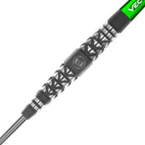Close-up angled view of Simon Whitlock Atomised tungsten dart barrel showing precision grip texture and barrel engraving