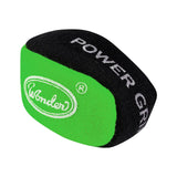 Angled close-up of Power Grip Ball for darts, green and black with textured surface and visible grip lettering, isolated on white background